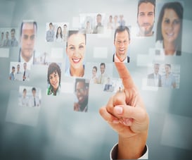 Close up of a man selecting a profile picture on digital screen